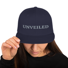 Load image into Gallery viewer, Unveiled Silver Font Snapback Hat
